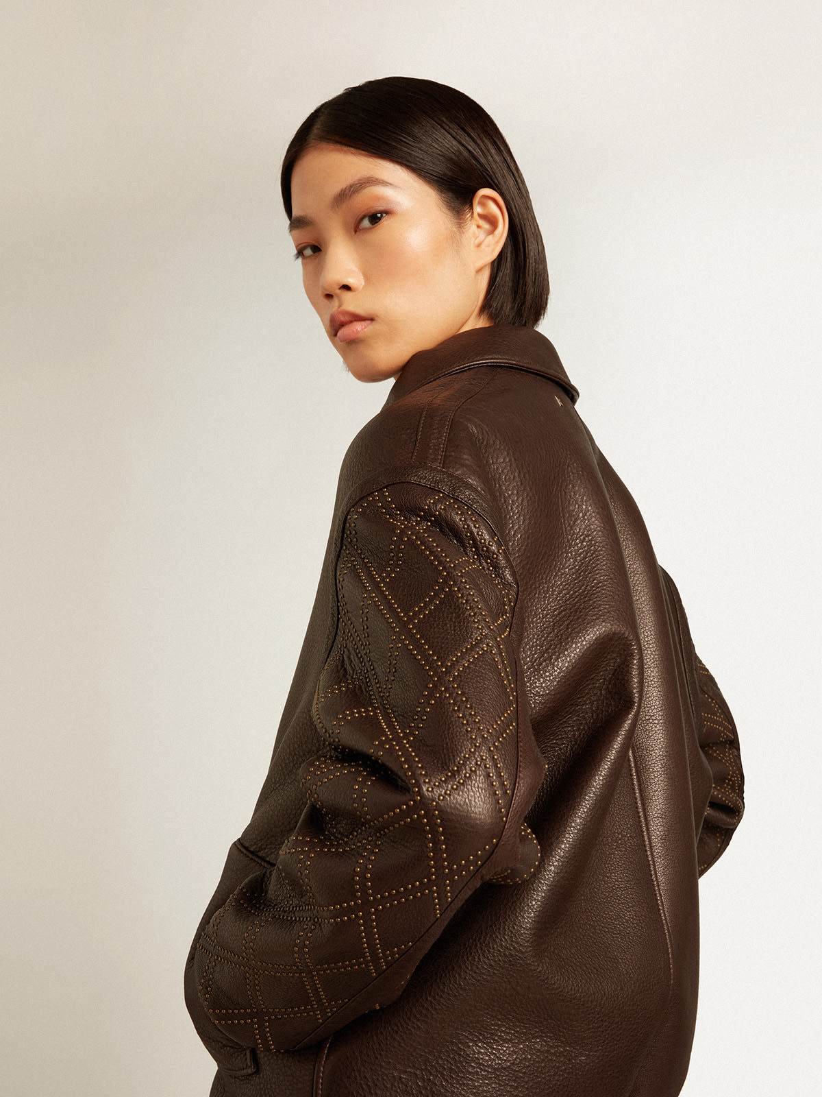 Brown nappa leather jacket with studded sleeves | Golden Goose