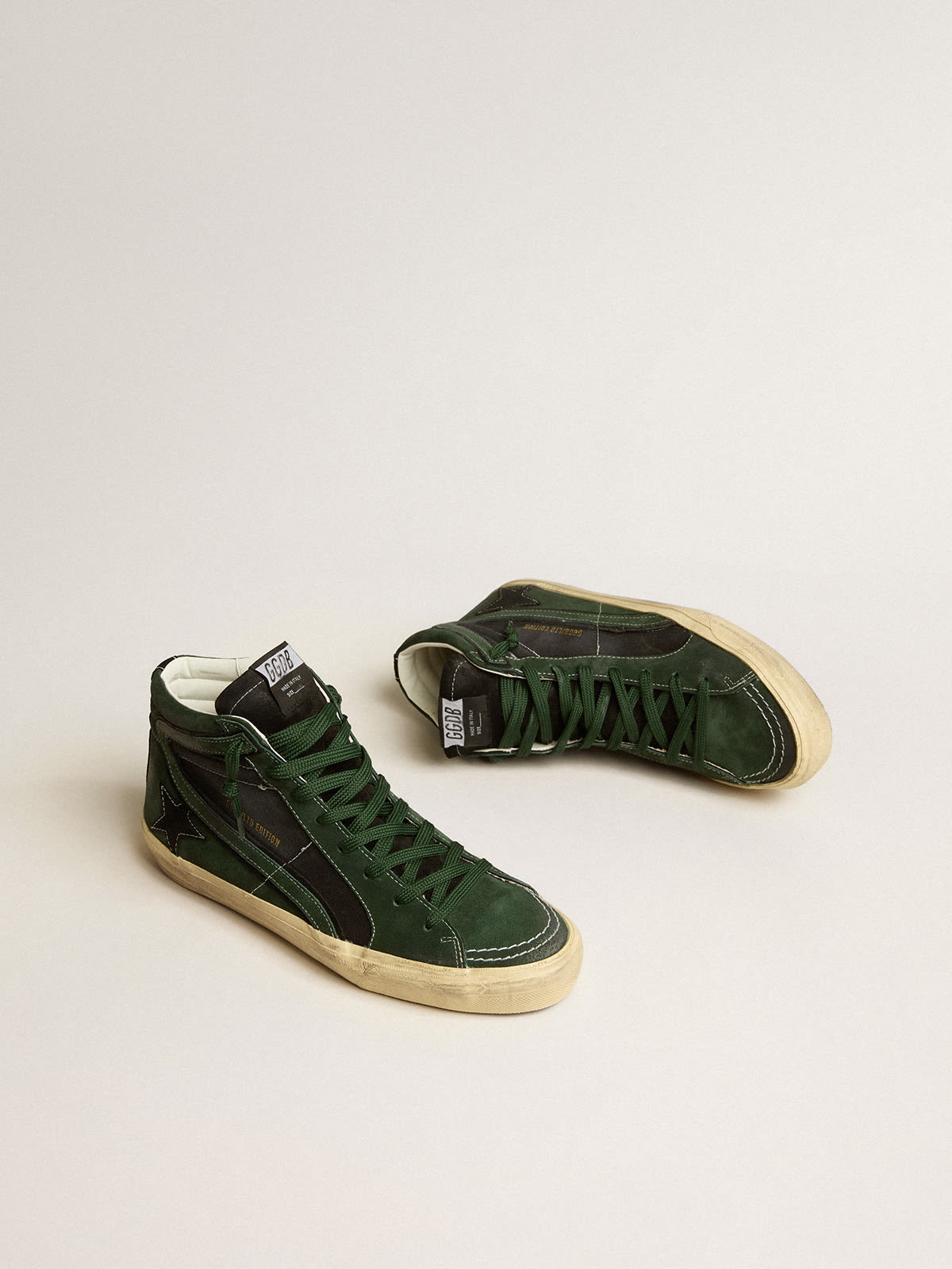 Slide LTD in green suede and black canvas with suede star and flash ...