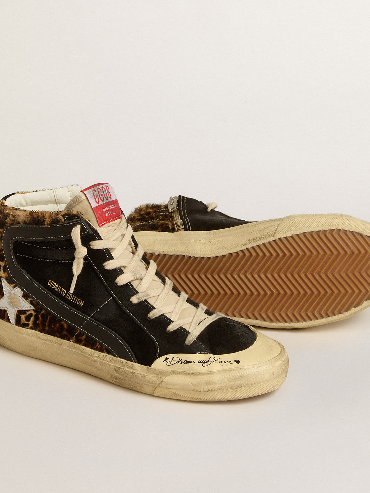 Slide Penstar LTD in leopard-print pony skin with silver star and black  flash | Golden Goose