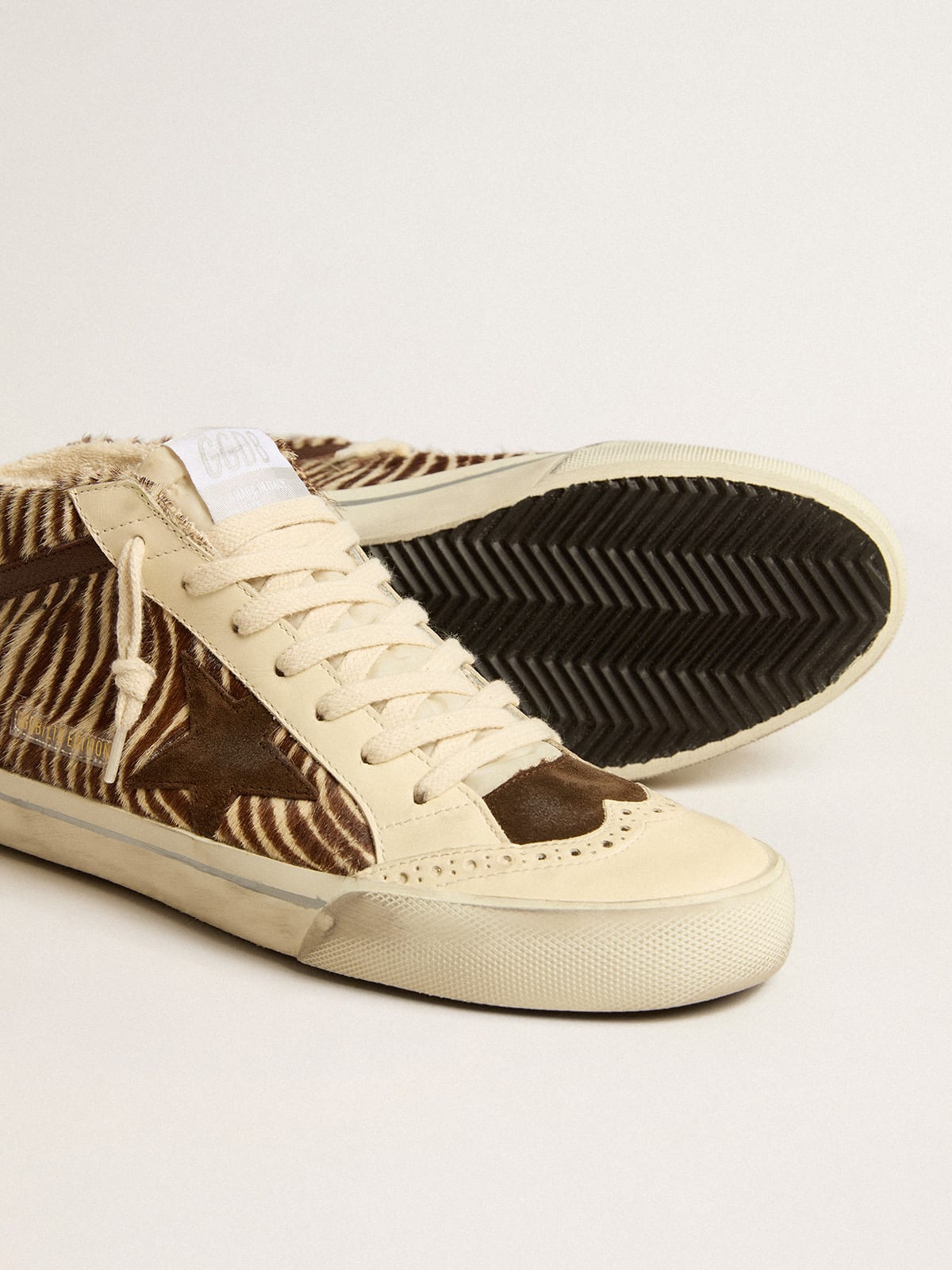 Mid Star in zebra-print pony skin with suede star and brown flash