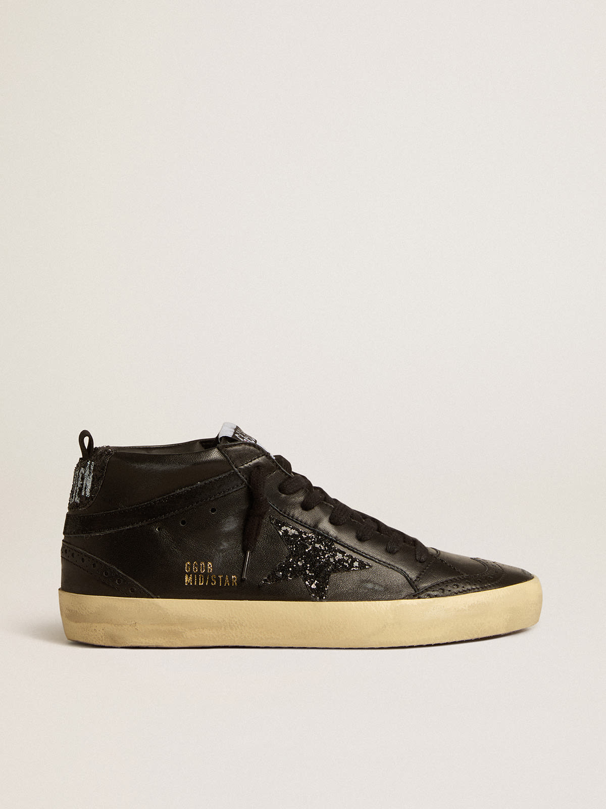 Golden goose best sale black glitter star