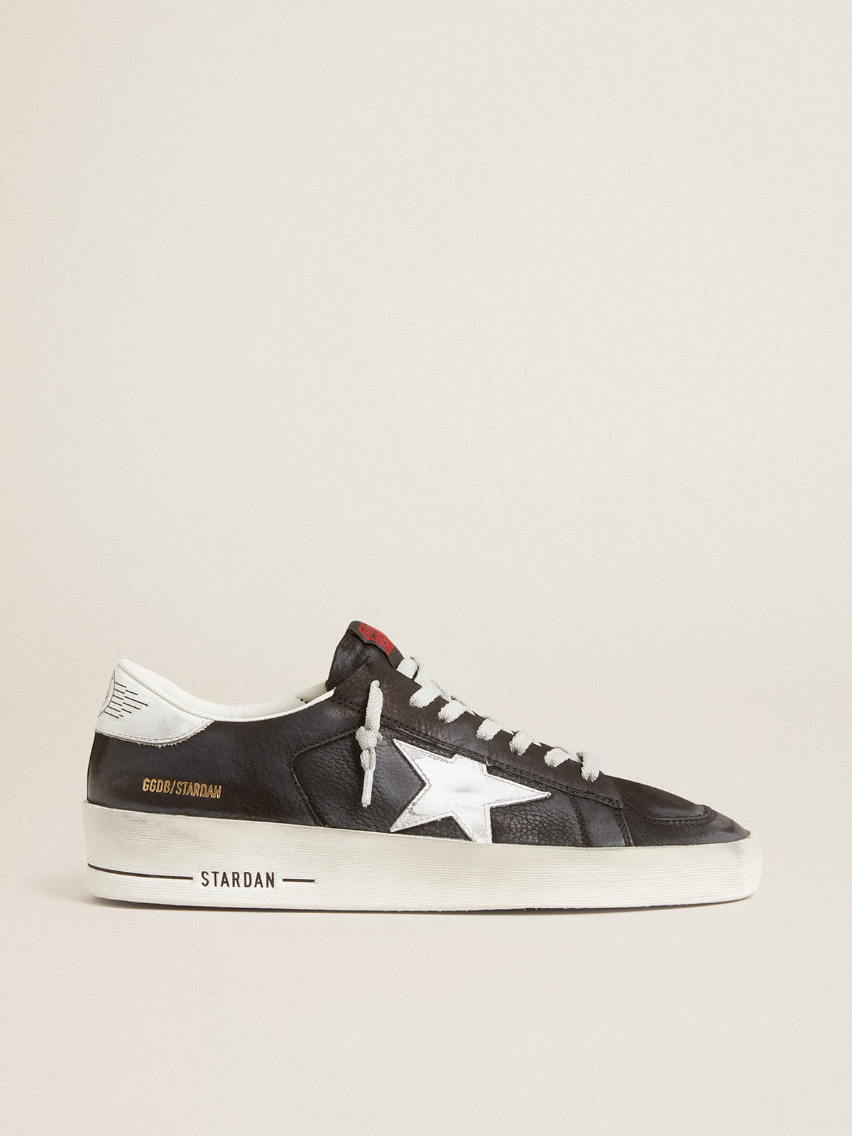 Stardan in black nubuck and mesh with gray leather star and heel