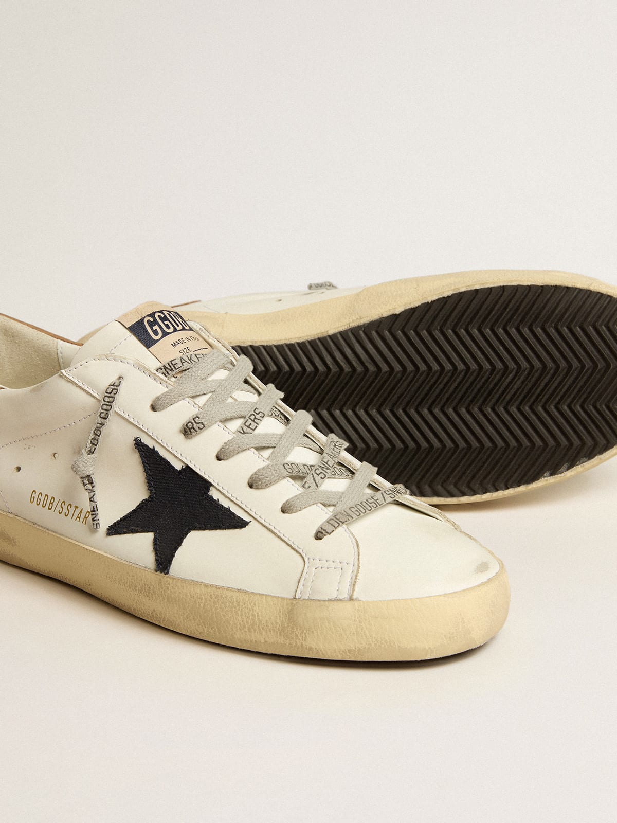 Super-Star with blue canvas star and tobacco leather heel tab