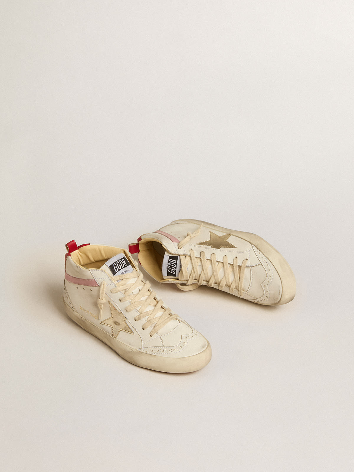 Bio-based Mid Star LTD with gold leather star and pink flash | Golden Goose