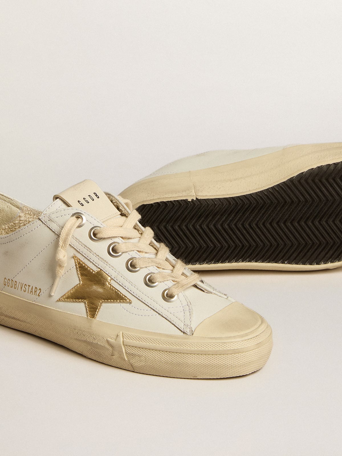 V Star in white leather with gold metallic leather star