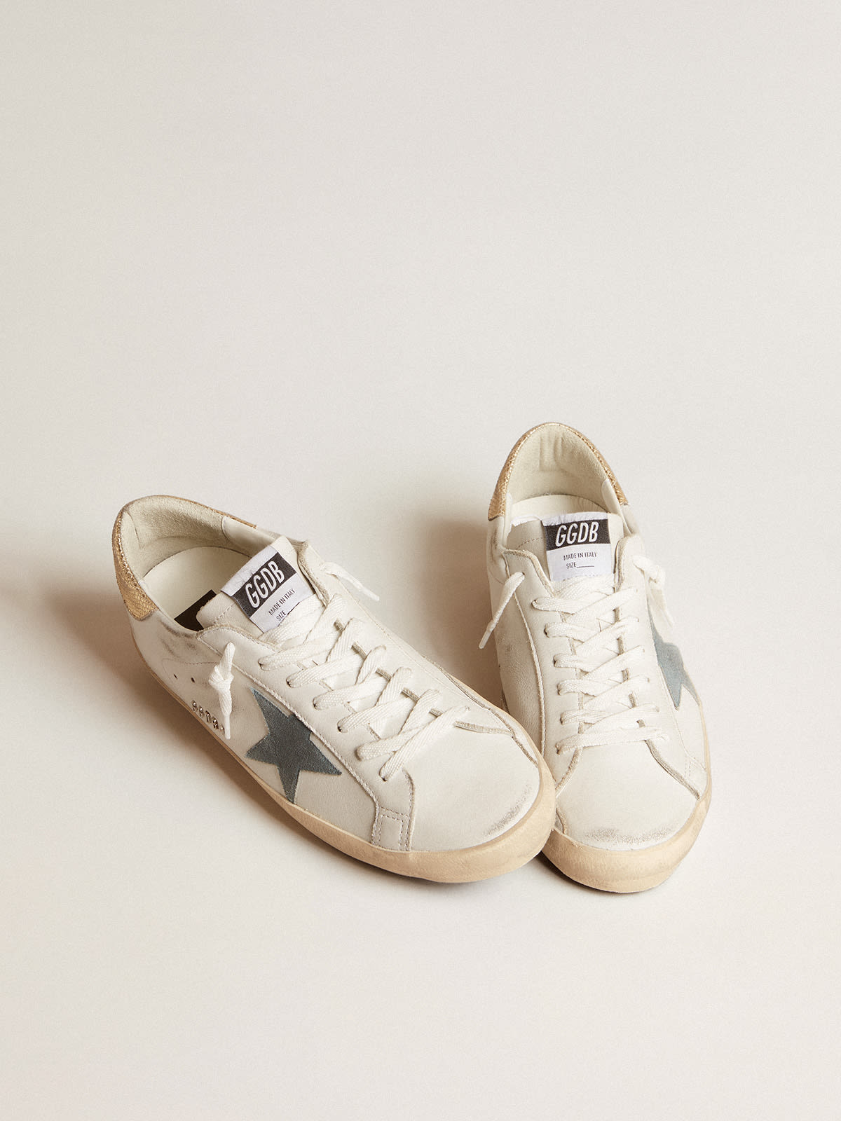 Super-Star with suede star and platinum snake-print leather heel tab |  Golden Goose