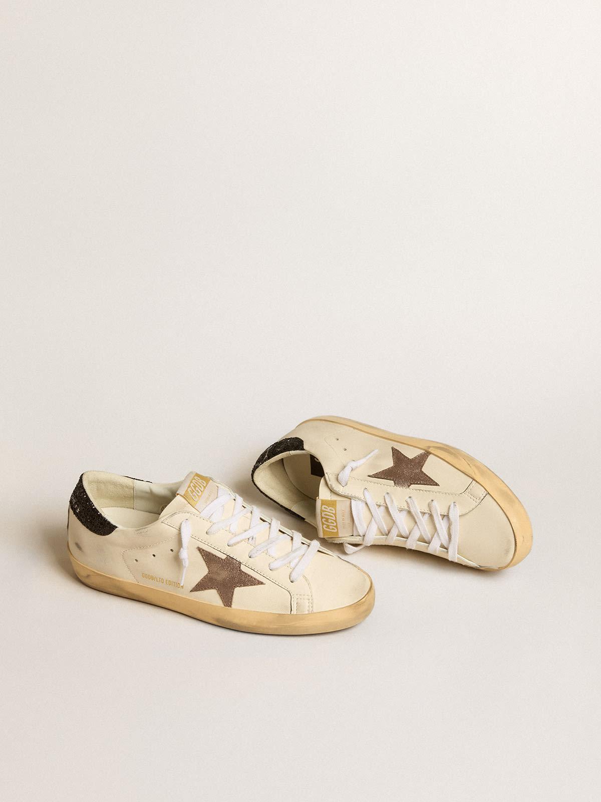 Super-Star LTD with laminated leather star and black glitter heel