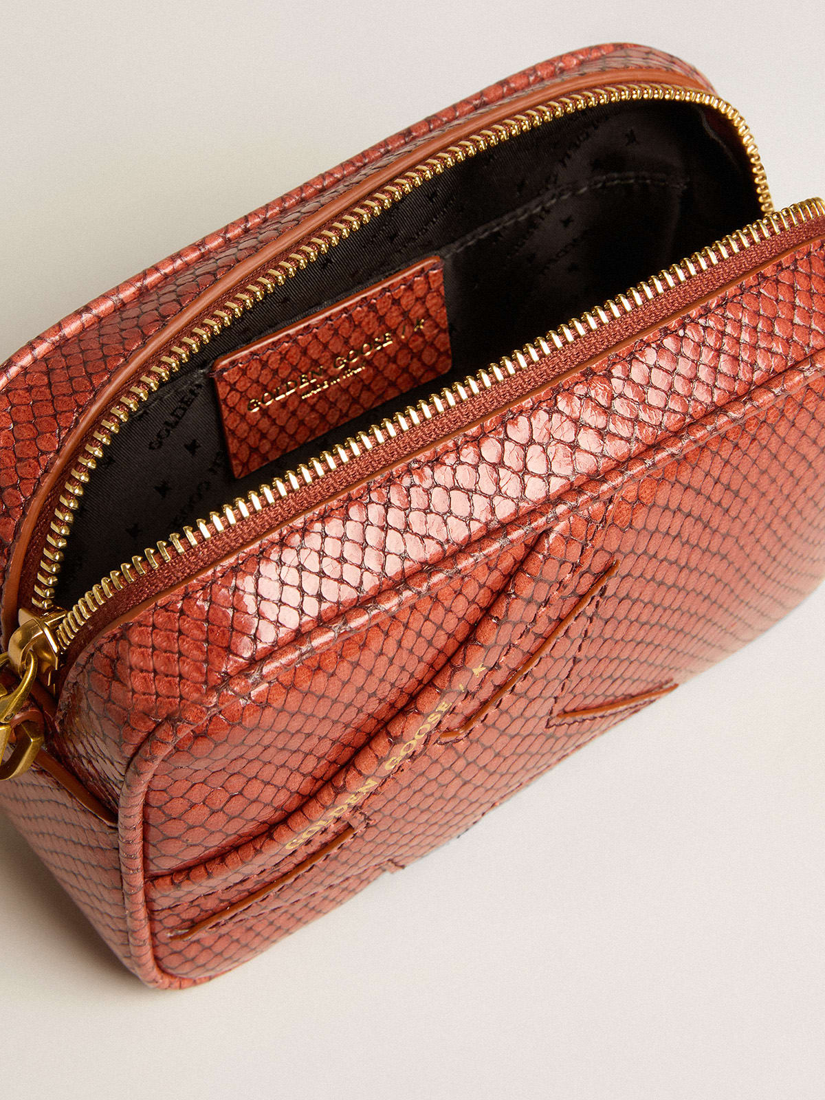Golden Goose - Mini Star Bag en cuir à imprimé python de couleur rouille in 