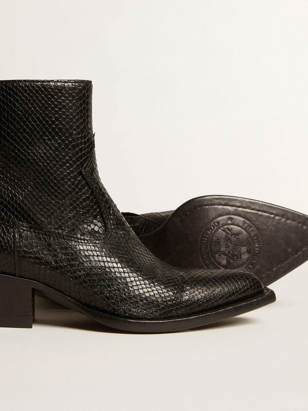 Saint laurent hot sale snake boots