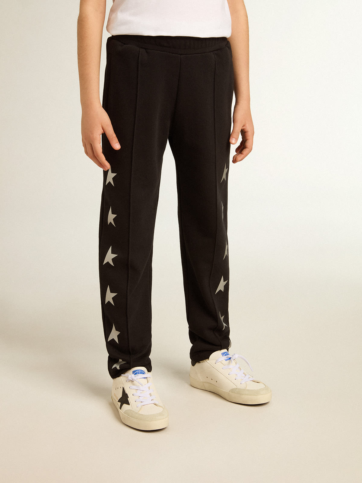 Girls' black leggings with white stars on the sides