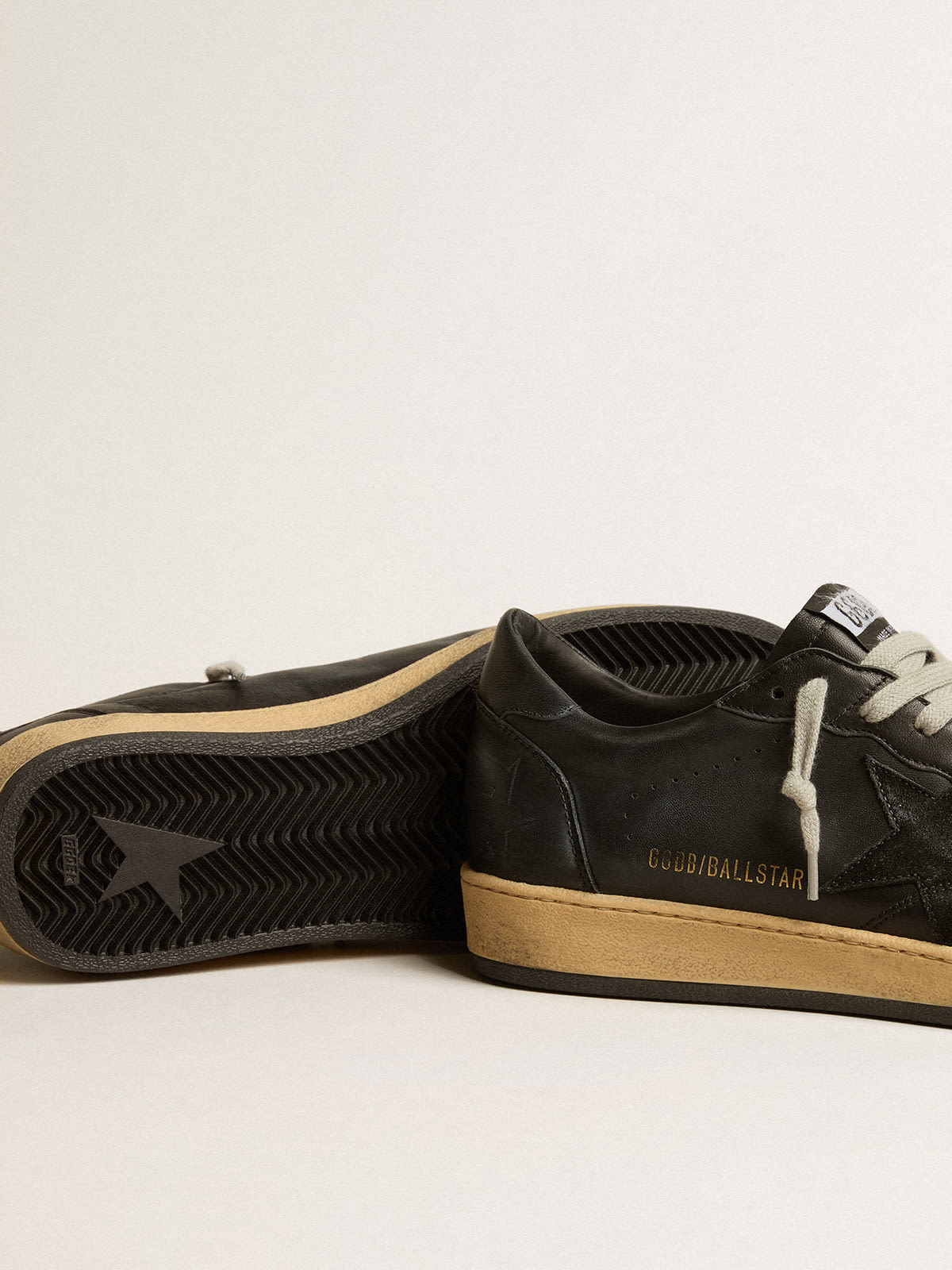 Super-Star in black nappa with black suede star and heel tab