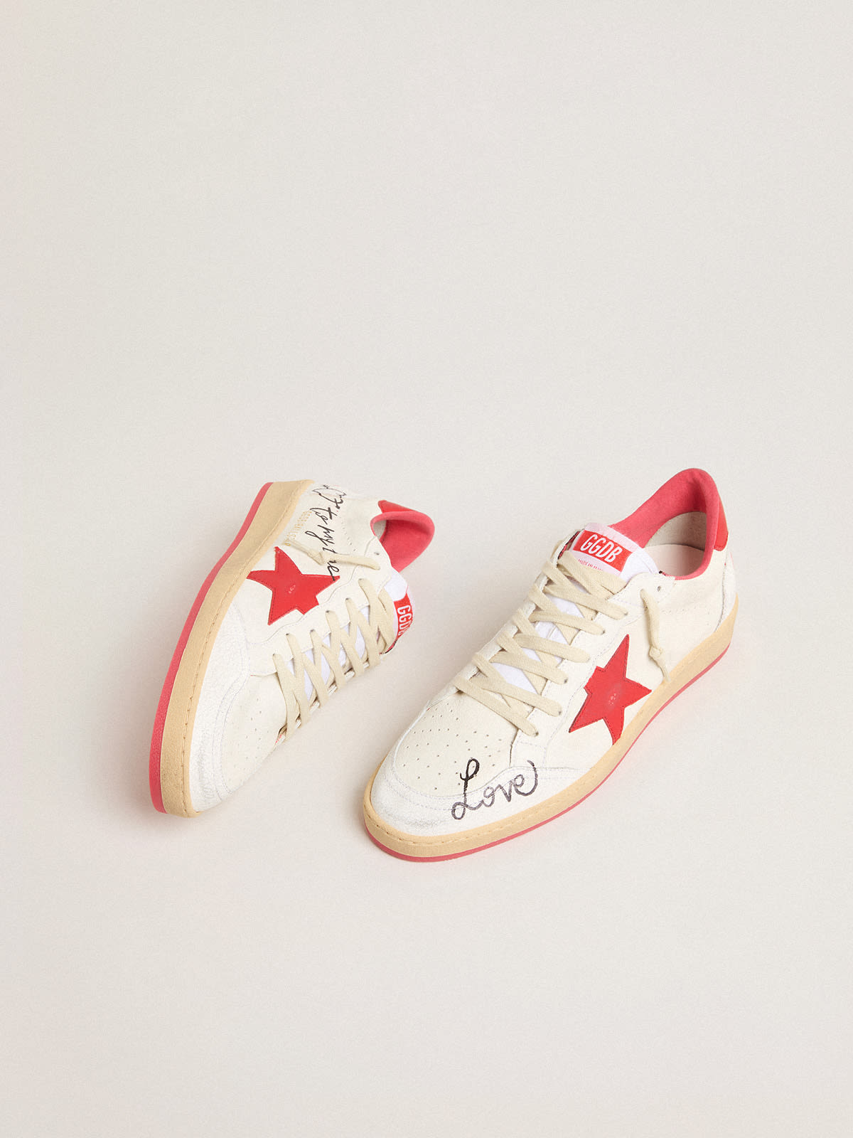 Men\'s Ball Star Wishes in white leather with a red star and heel tab |  Golden Goose