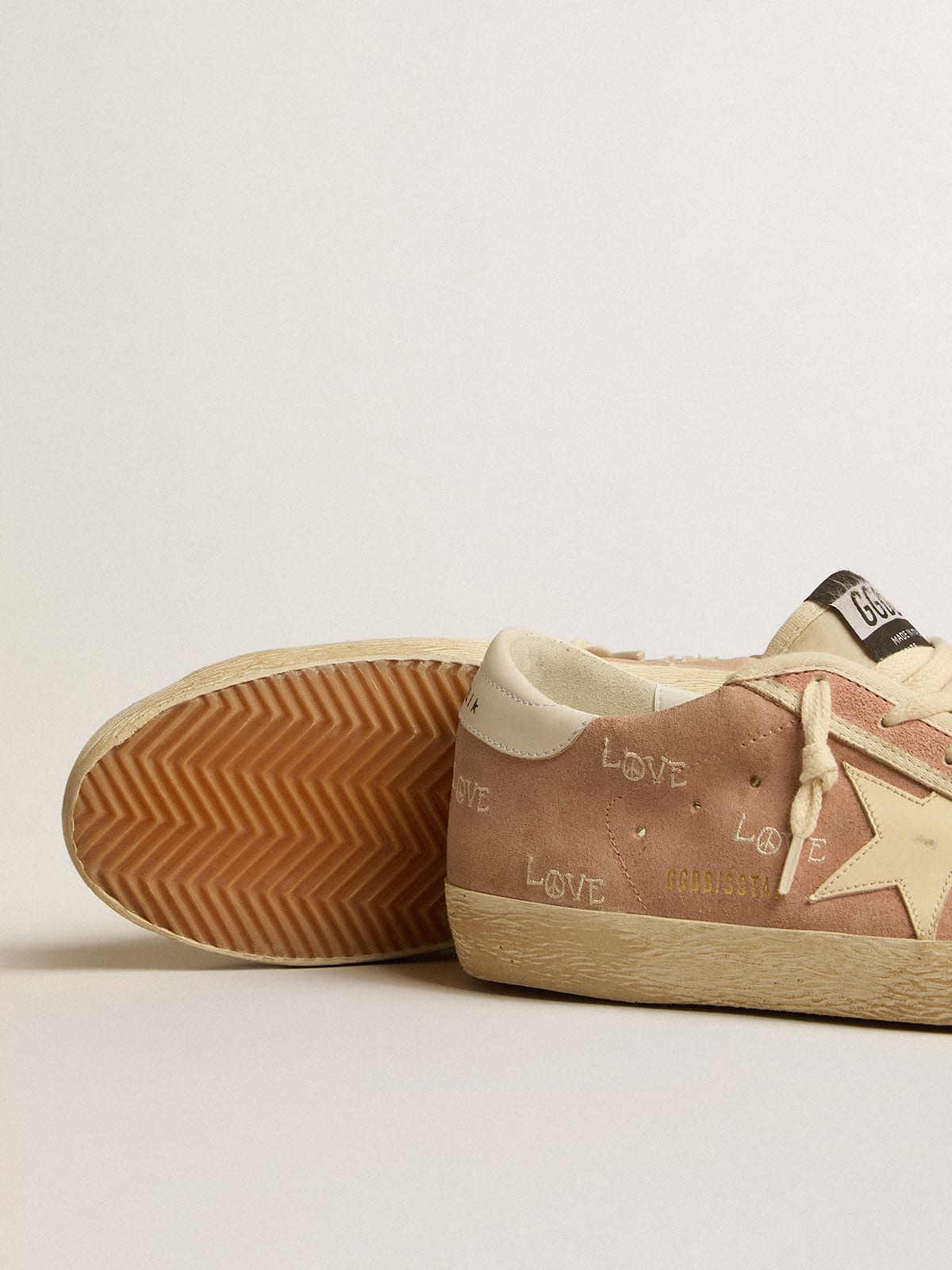 Old School Junior in pink suede with cream leather star and heel tab