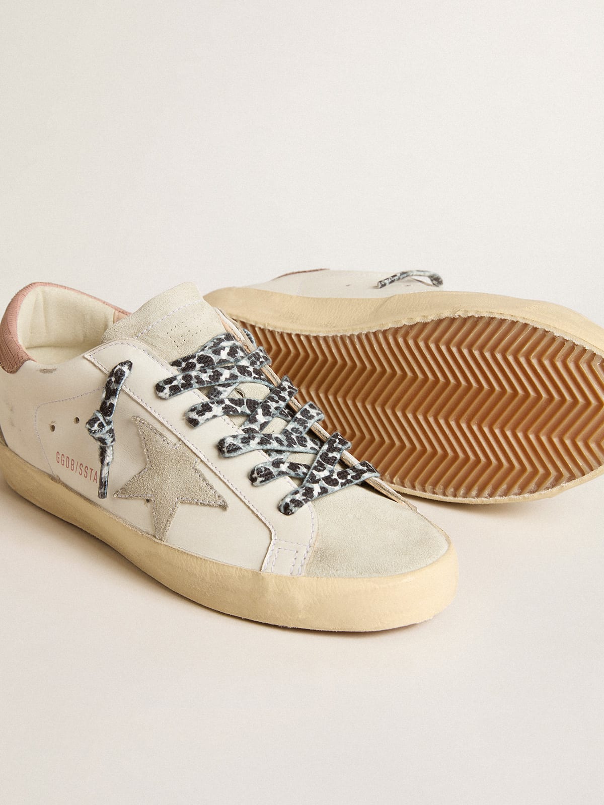 Super-Star with ice-gray star and pink lizard-print heel tab | Golden Goose