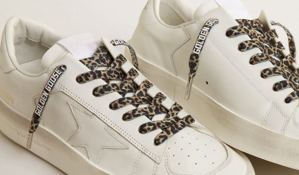 White-sneakers-with-Beige-and-brown-leopard-laces-with-contrasting-white-logo